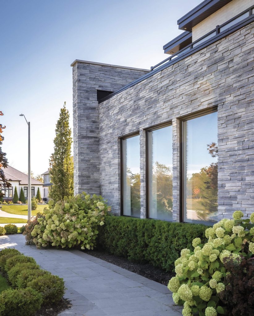 A Textured Facade: Stone, Brick and Vegetation in a Three-Dimensional Composition