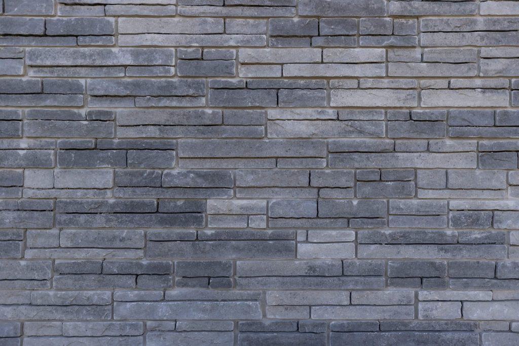 A Textured Facade: Stone, Brick and Vegetation in a Three-Dimensional Composition
